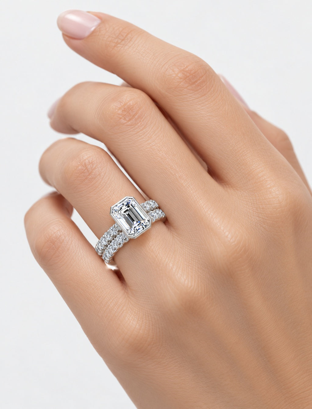 The Imperial IGI Certified Lab Grown Emerald-Cut Bezel-Set Solitaire Bridal Suite with Pavé Bands in Gold & Platinum – 1–4Ct