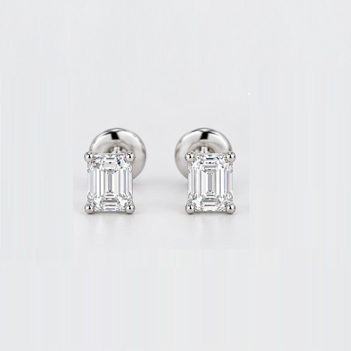 GIA Certified E/VVS2 0.30 Carat Emerald Stud Earrings 950 Platinum