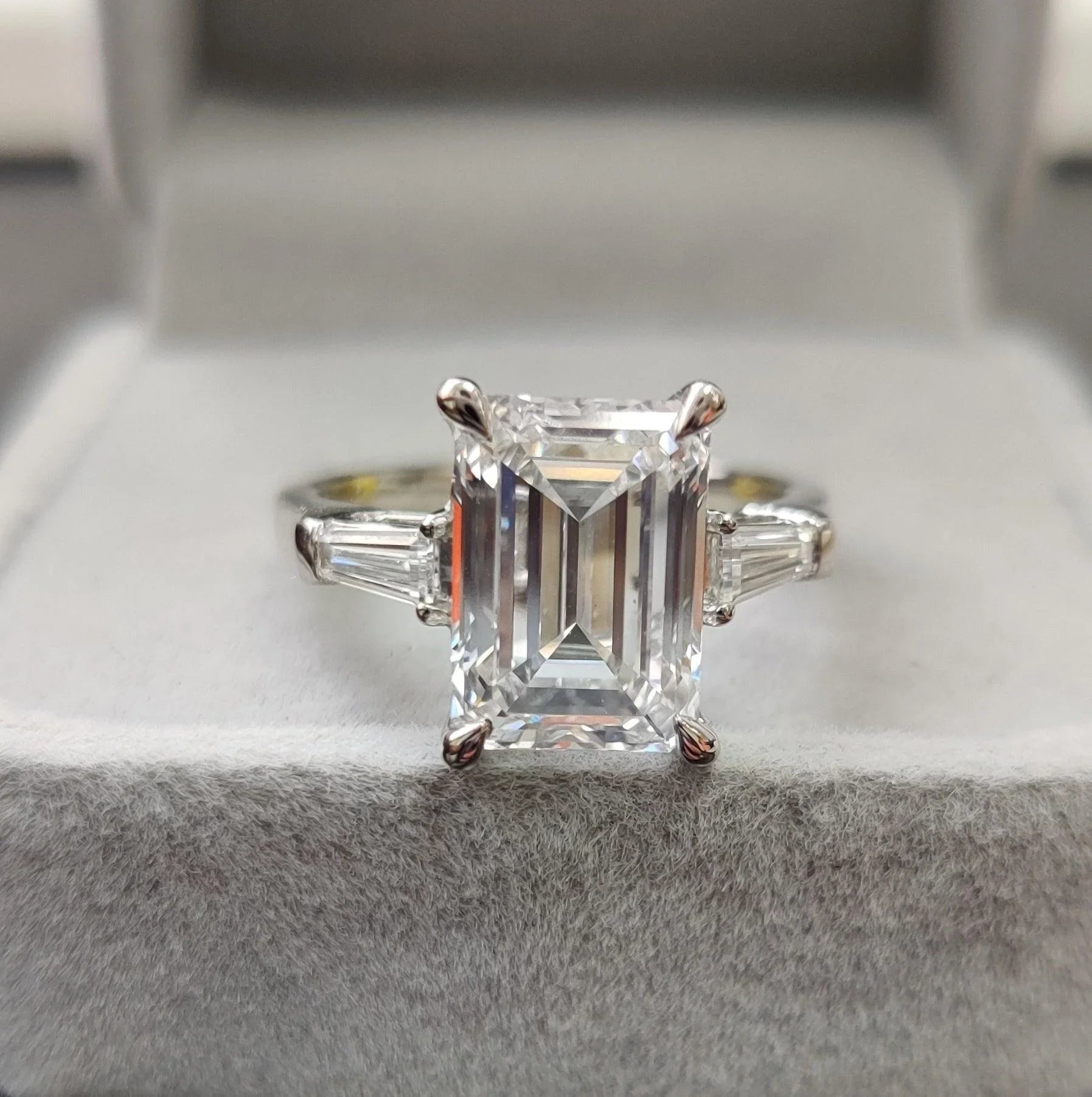 IGI Certified 4.75Ct F/VS Emerald Cut Diamond Trilogy Engagement Ring