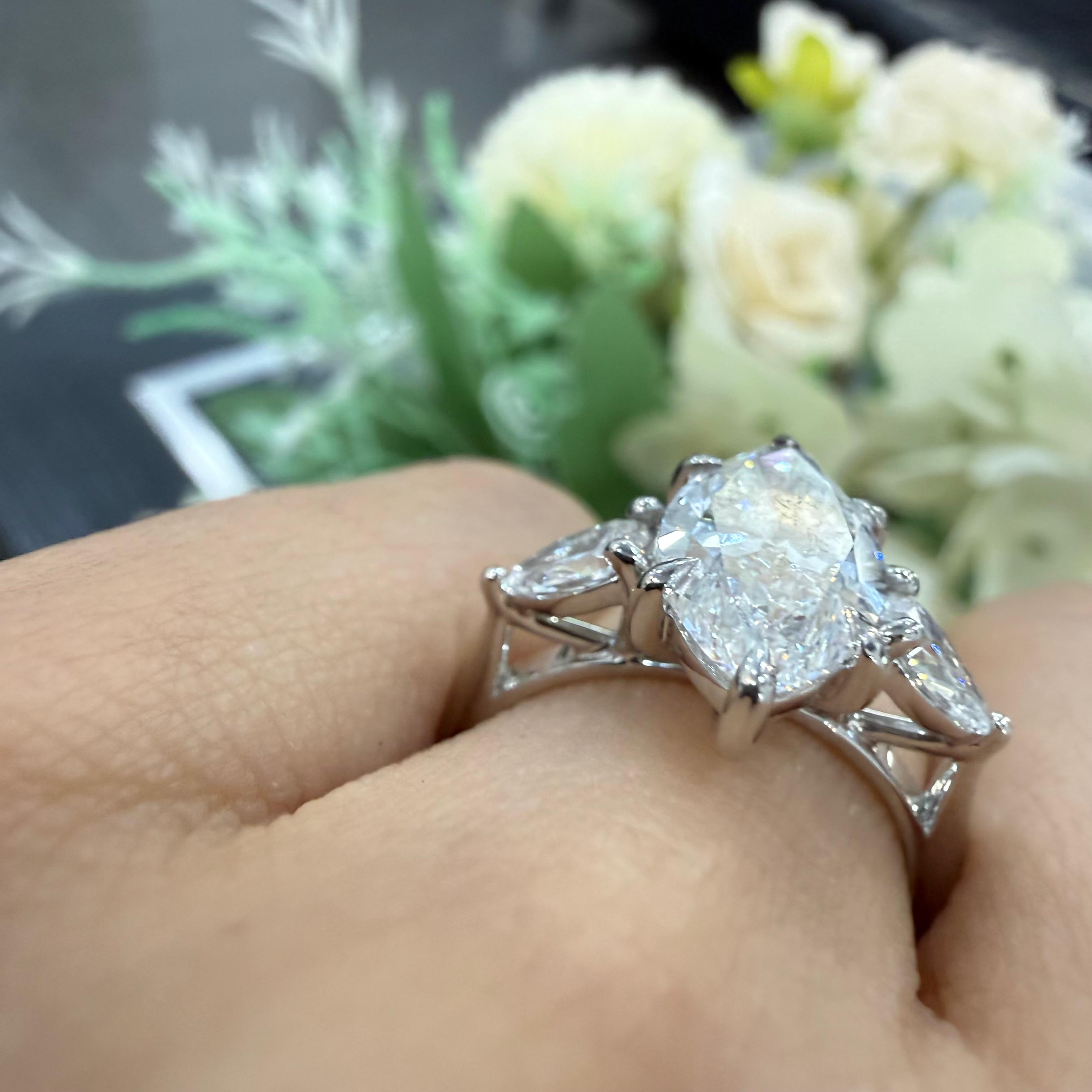 IGI Certified 3.00ct E/VS Marquise & Pear Diamond Three Stone Ring In Platinum
