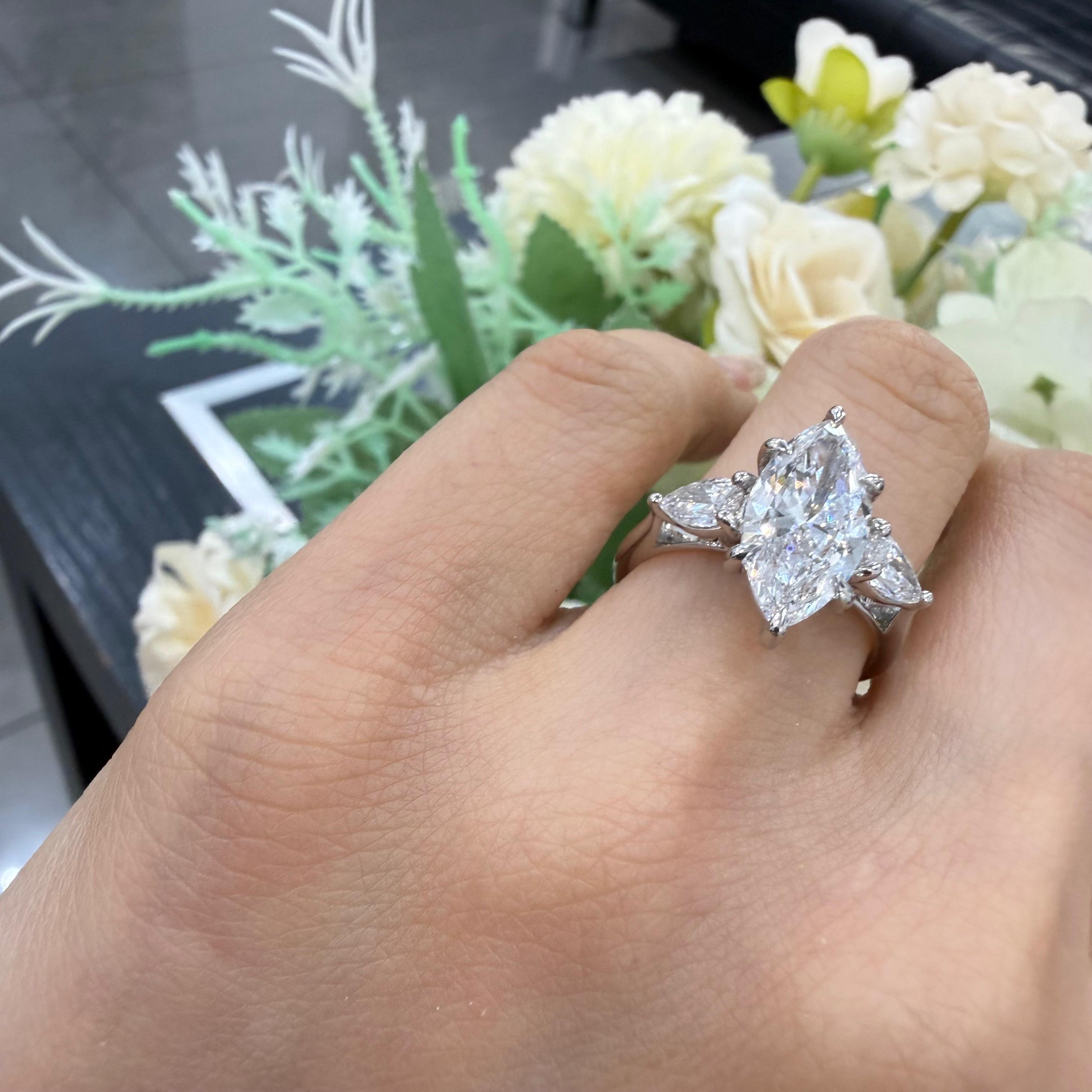 IGI Certified 3.00ct E/VS Marquise & Pear Diamond Three Stone Ring In Platinum
