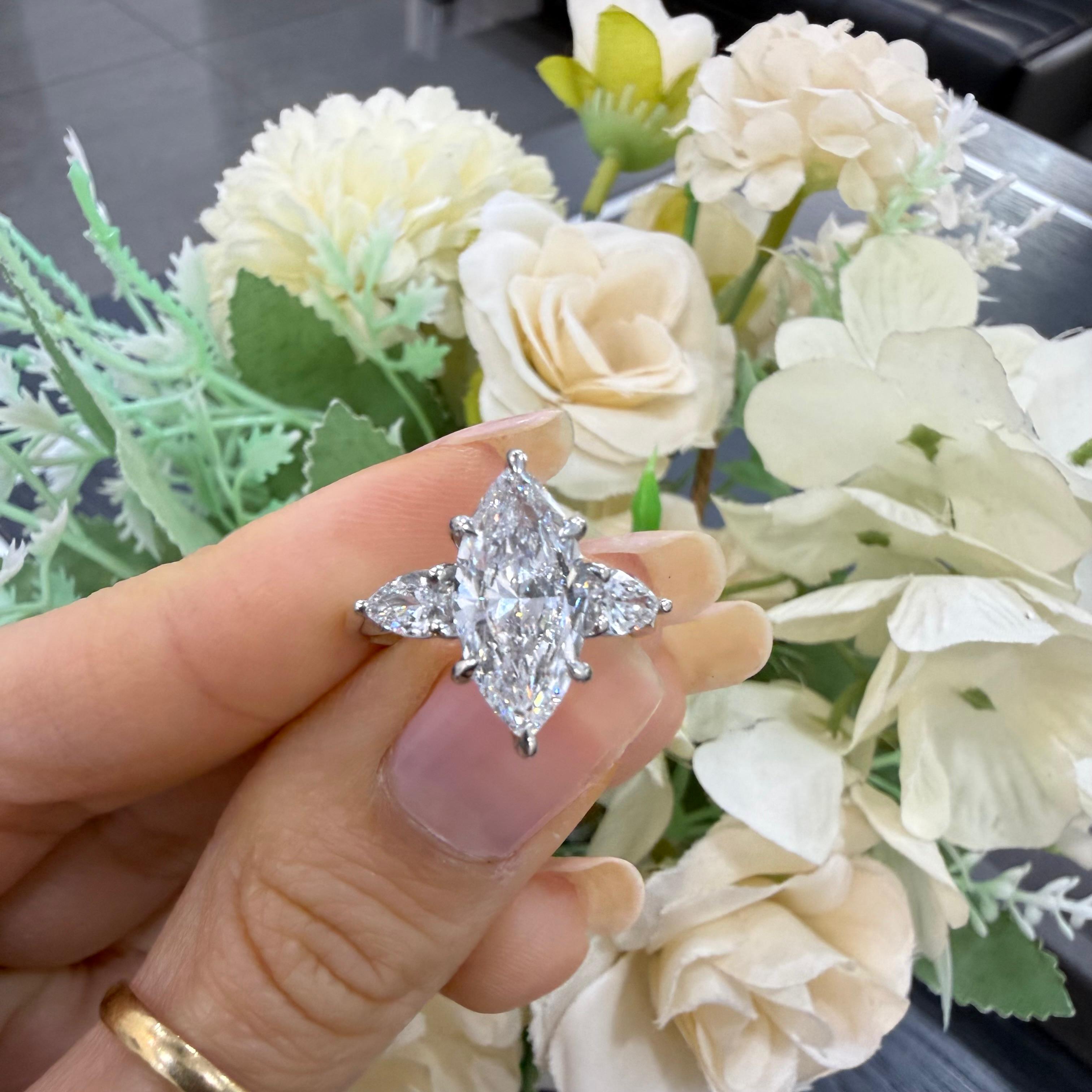 IGI Certified 3.00ct E/VS Marquise & Pear Diamond Three Stone Ring In Platinum