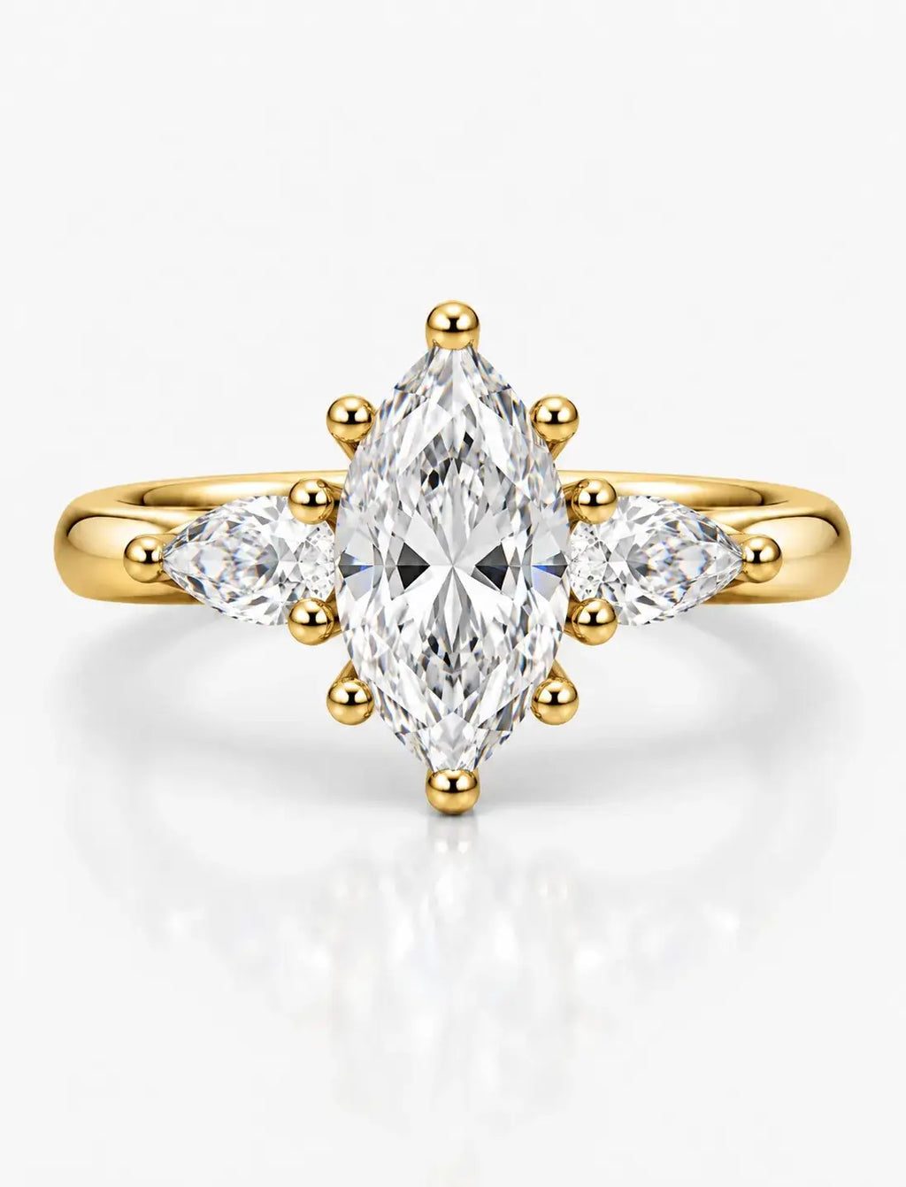 Marquise Diamond with Side Pear Diamond Trilogy Claw Set Engagement Ring in 18K Yellow Gold IGI Lab Grown