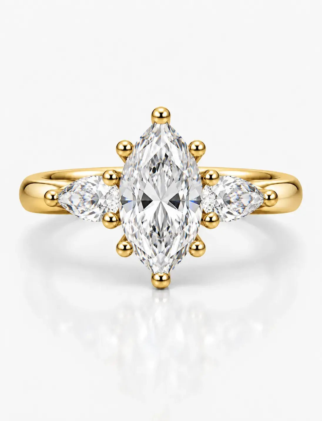 Marquise Diamond with Side Pear Diamond Trilogy Claw Set Engagement Ring in 18K Yellow Gold IGI Lab Grown