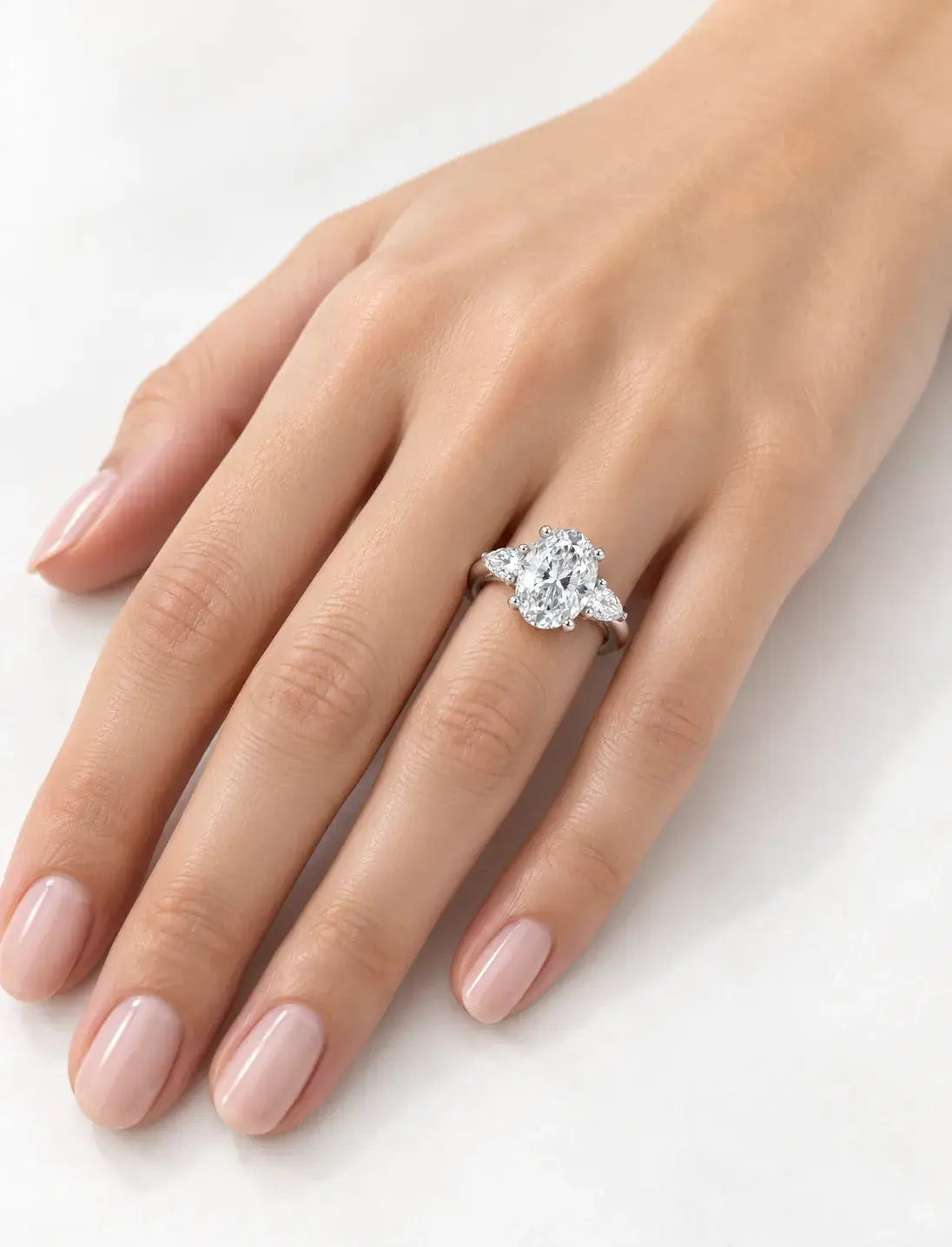 Oval Diamond Engagement Ring Oval Cut Three-Stone Engagement Ring with Pear Side Stones 18K Yellow Gold