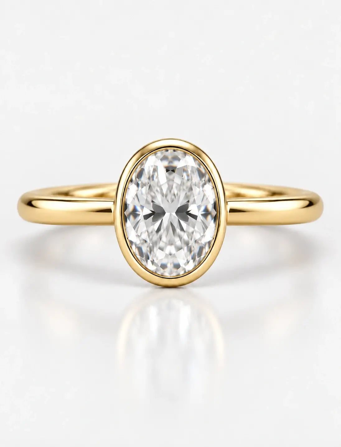 IGI Certified Lab Grown Oval Diamond Bezel Set Solitaire Engagement Ring in 18k Yellow Gold