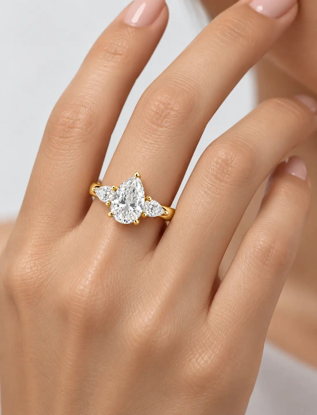Lab Grown Diamond IGI Certified Pear Cut Trilogy Diamond Claw Set Engagement Ring 18K Yellow Gold