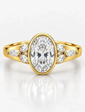 IGI Certified Lab Grown Oval diamond with Side Marquise & Round Diamond Bezel Set Engagement Ring 18k Yellow Gold