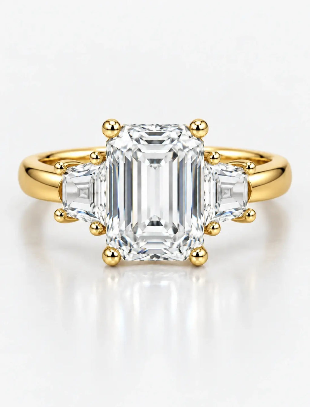 IGI Lab Grown The Classic Three-Stone Emerald Cut Diamond Engagement Ring with Trapezoid Side Stones in 18K Yellow Gold