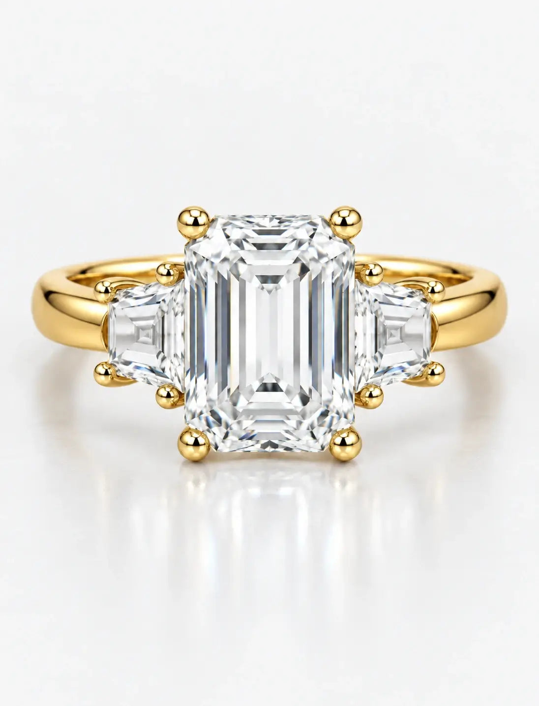 IGI Lab Grown The Classic Three-Stone Emerald Cut Diamond Engagement Ring with Trapezoid Side Stones in 18K Yellow Gold