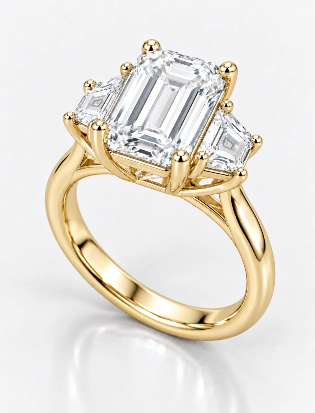 IGI Lab Grown The Classic Three-Stone Emerald Cut Diamond Engagement Ring with Trapezoid Side Stones in 18K Yellow Gold