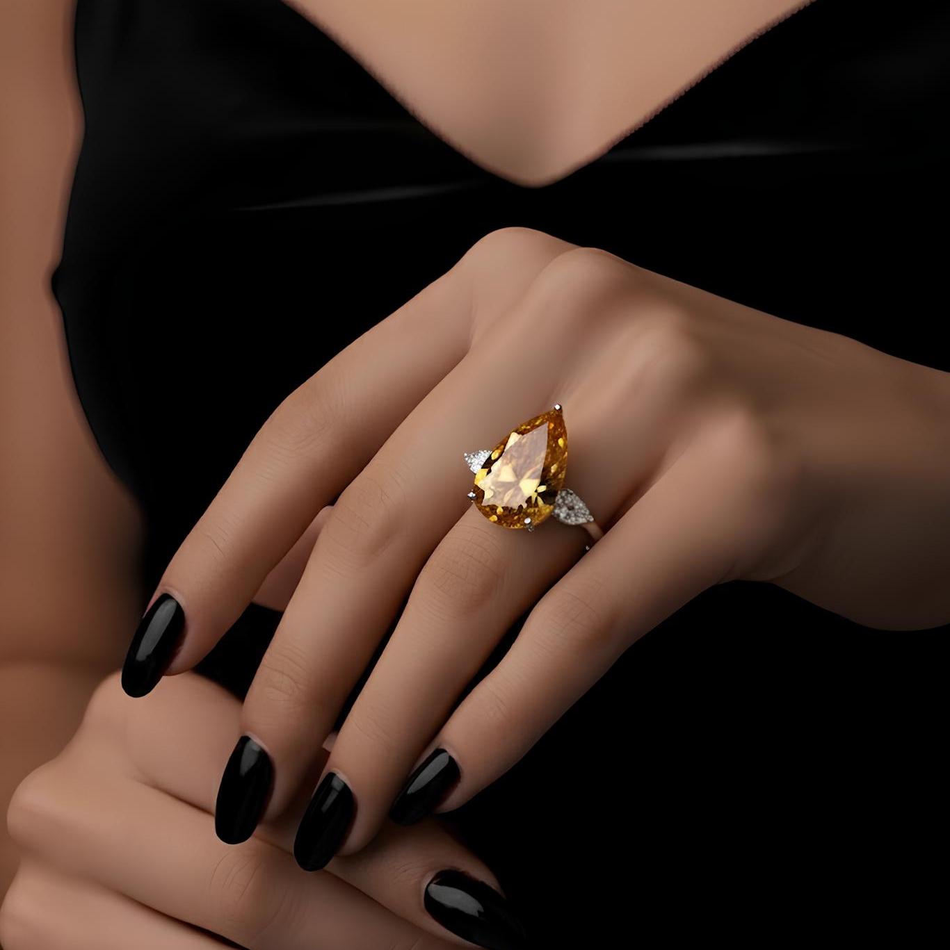 Rare Beauty: Certified 12.50ct Fancy Vivid Brownish Yellow Pear Diamond Trilogy Ring in Platinum