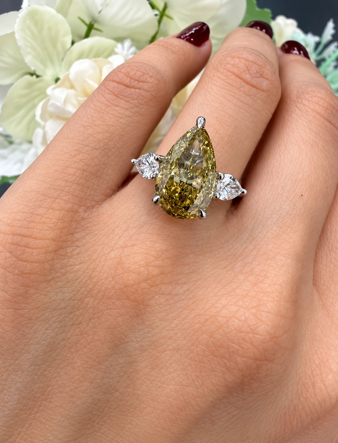 Pear Diamond Fancy Intense Yellow Engagement Ring side Pear Trilogy Ring IGI Lab Grown in Platinum
