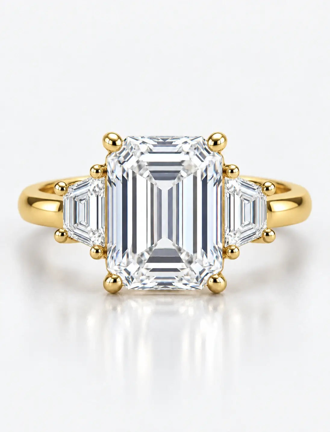 IGI Certified Lab Grown Classic Emerald-Cut Three-Stone Ring with Trapezoid Side Stones in Gold & Platinum