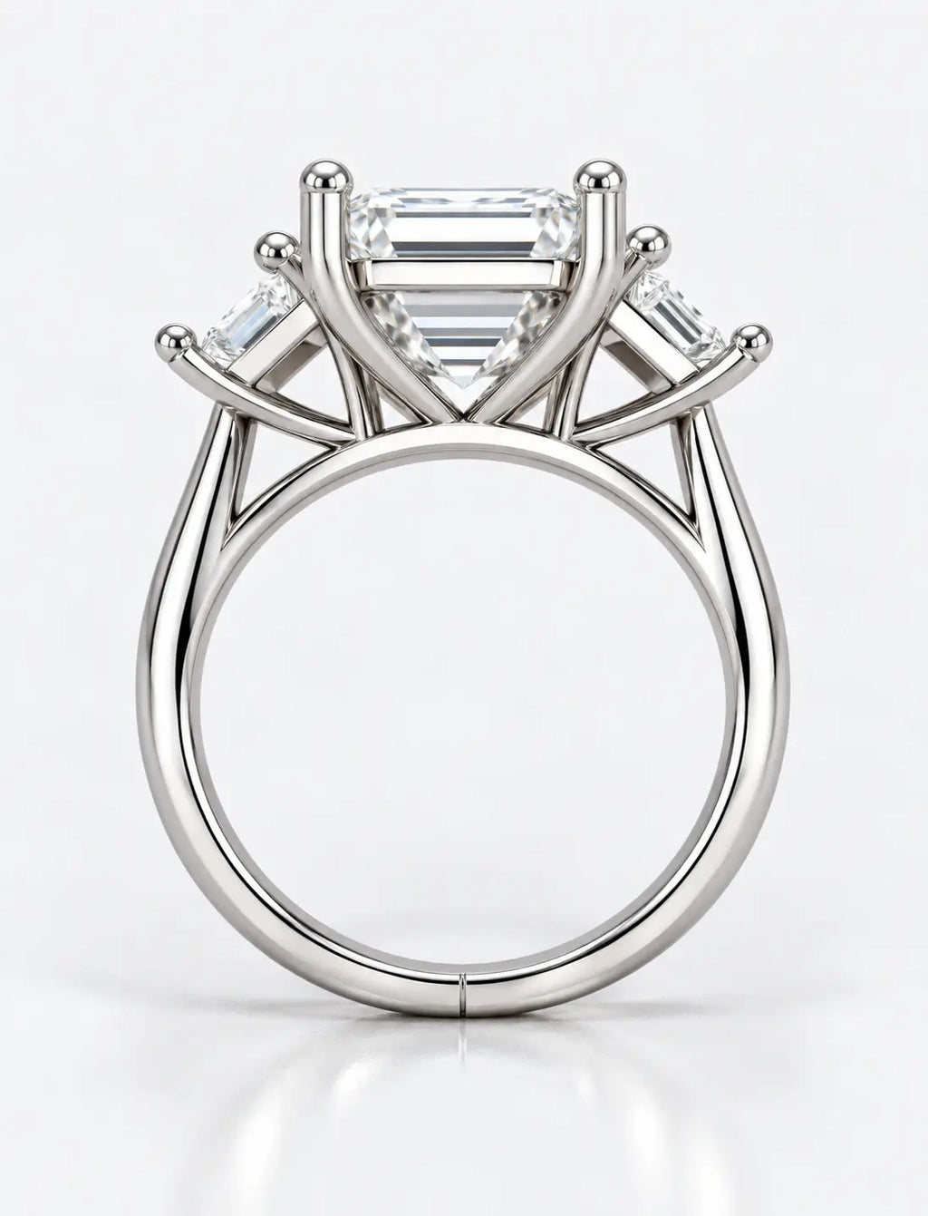 IGI Certified Lab Grown Classic Emerald-Cut Three-Stone Ring with Trapezoid Side Stones in Gold & Platinum