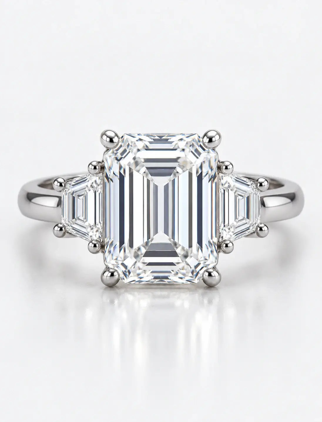 IGI Certified Lab Grown Classic Emerald-Cut Three-Stone Ring with Trapezoid Side Stones in Gold & Platinum