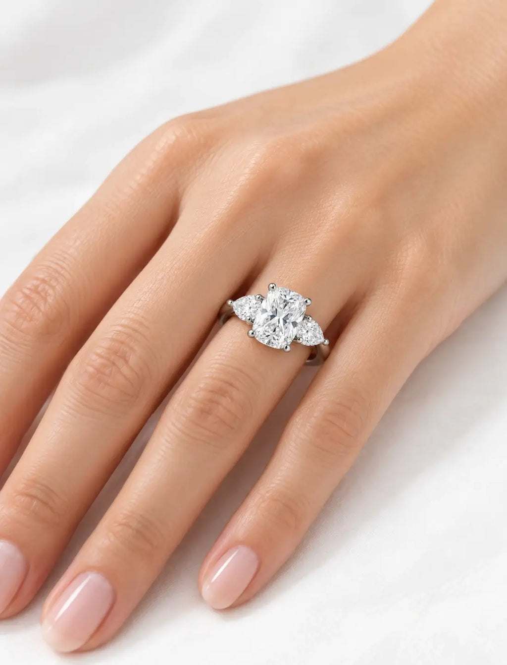 Cushion Diamond with side Pear Diamond Trilogy Ring Platinum Lab Grown Diamonds IGI Certified