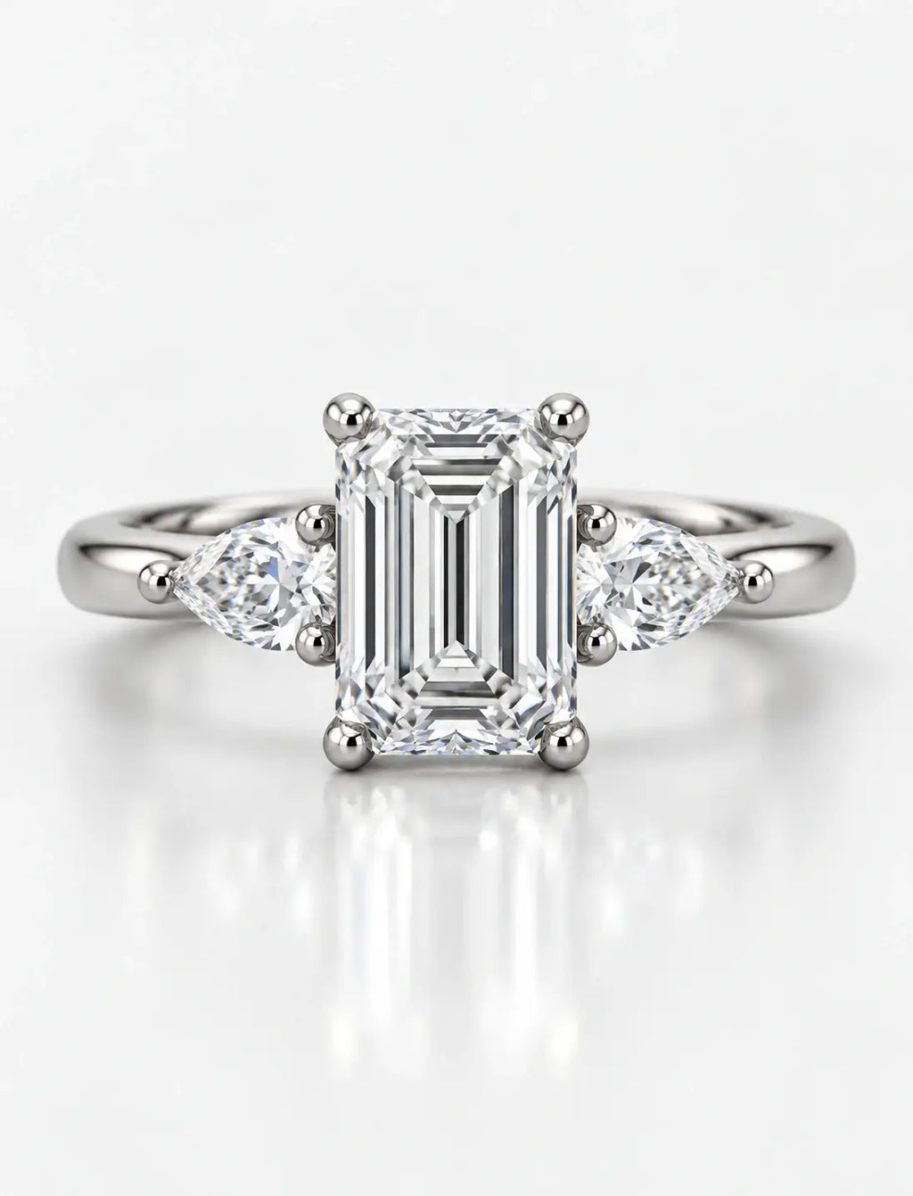 Women's IGI Certified Lab Grown Emerald & Pear Three Stone Engagement Ring in Platinum