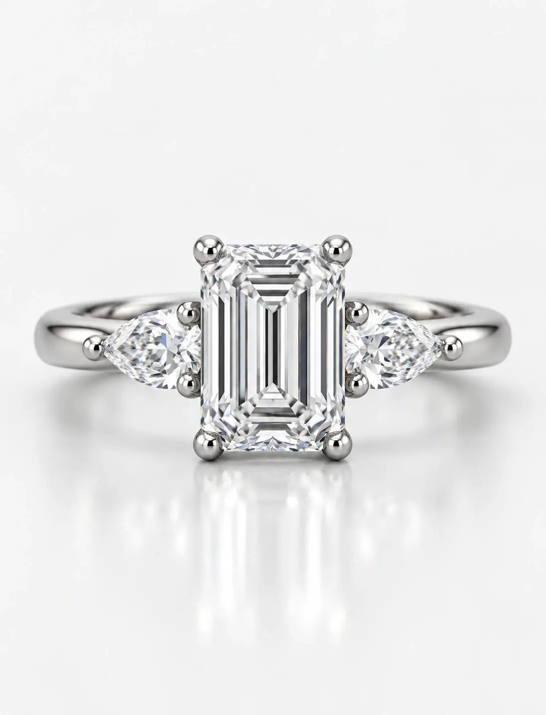 Women's IGI Certified Lab Grown Emerald & Pear Three Stone Engagement Ring in Platinum