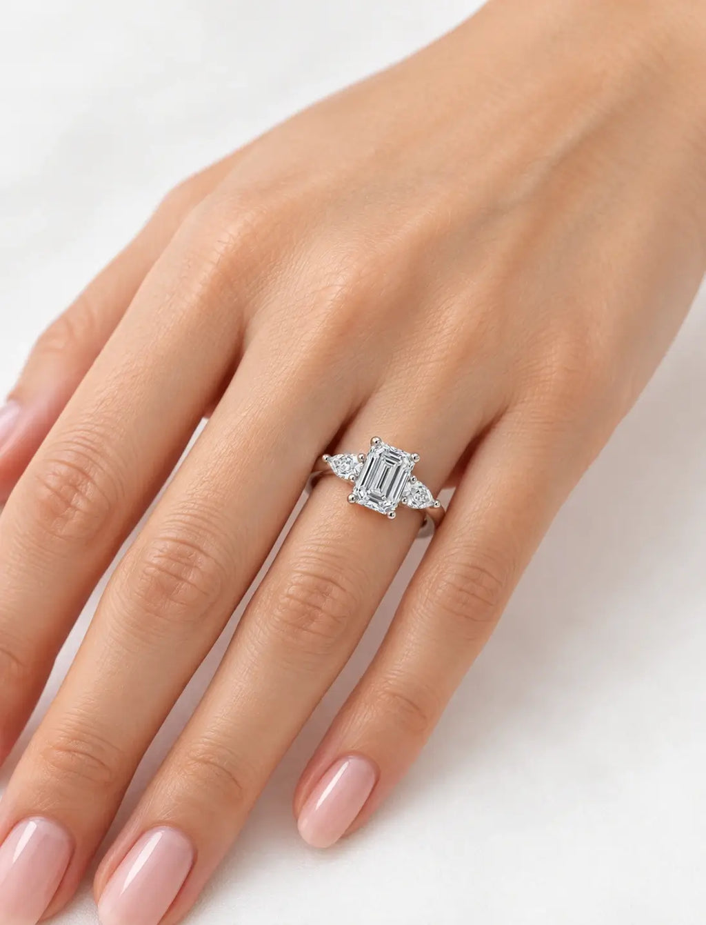 Women's IGI Certified Lab Grown Emerald & Pear Three Stone Engagement Ring in Platinum