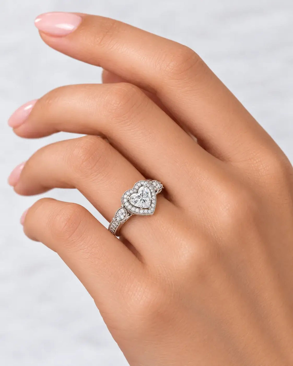 IGI Certified Lab Grown Diamond Heart Shape with side Round Diamond Halo Set Engagement Ring In Platinum