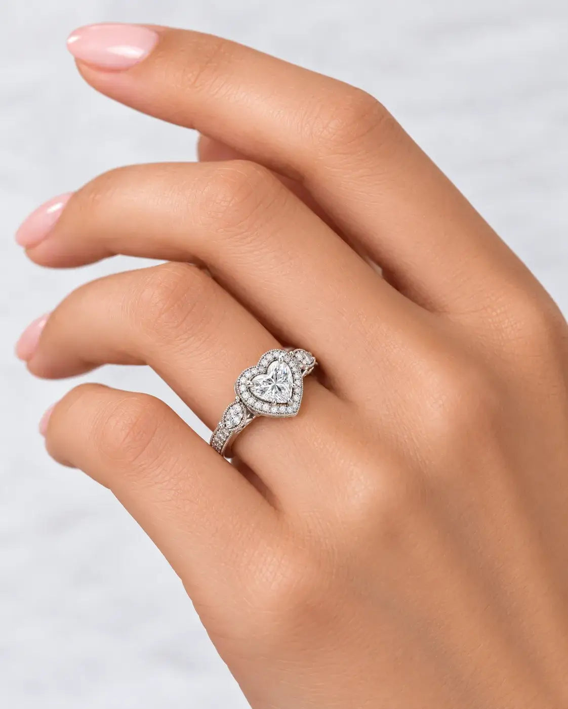IGI Certified Lab Grown Diamond Heart Shape with side Round Diamond Halo Set Engagement Ring In Platinum