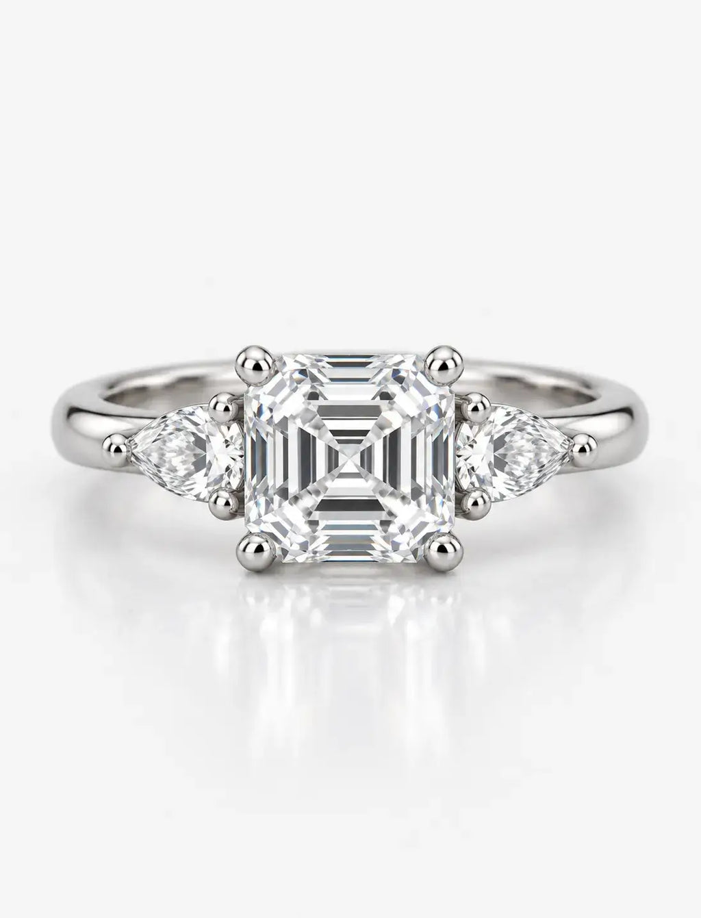 Asscher & Pear Cut Diamond Enaggement Ring in Platinum IGI Certified Lab Grown The Step-Cut Elegance Trilogy Style