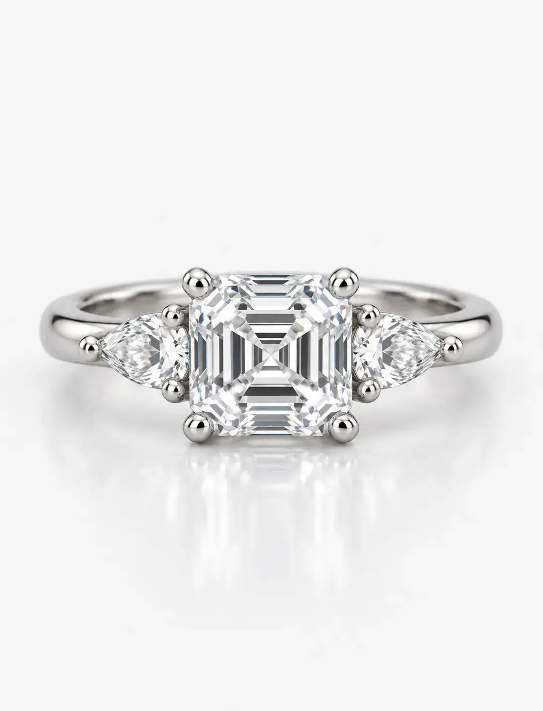 Asscher & Pear Cut Diamond Enaggement Ring in Platinum IGI Certified Lab Grown The Step-Cut Elegance Trilogy Style
