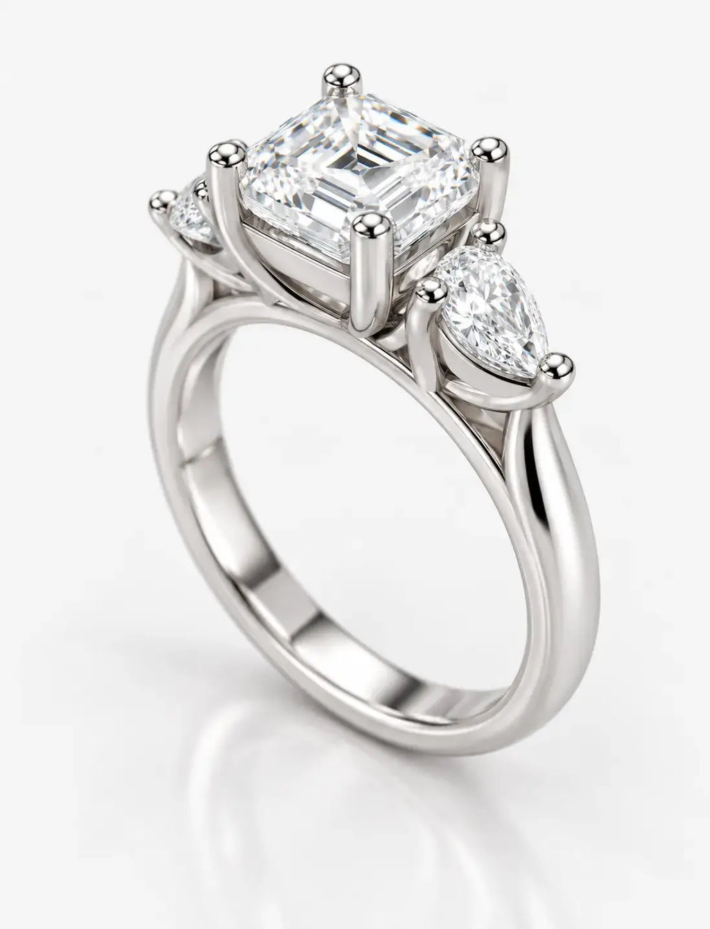 Asscher & Pear Cut Diamond Enaggement Ring in Platinum IGI Certified Lab Grown The Step-Cut Elegance Trilogy Style