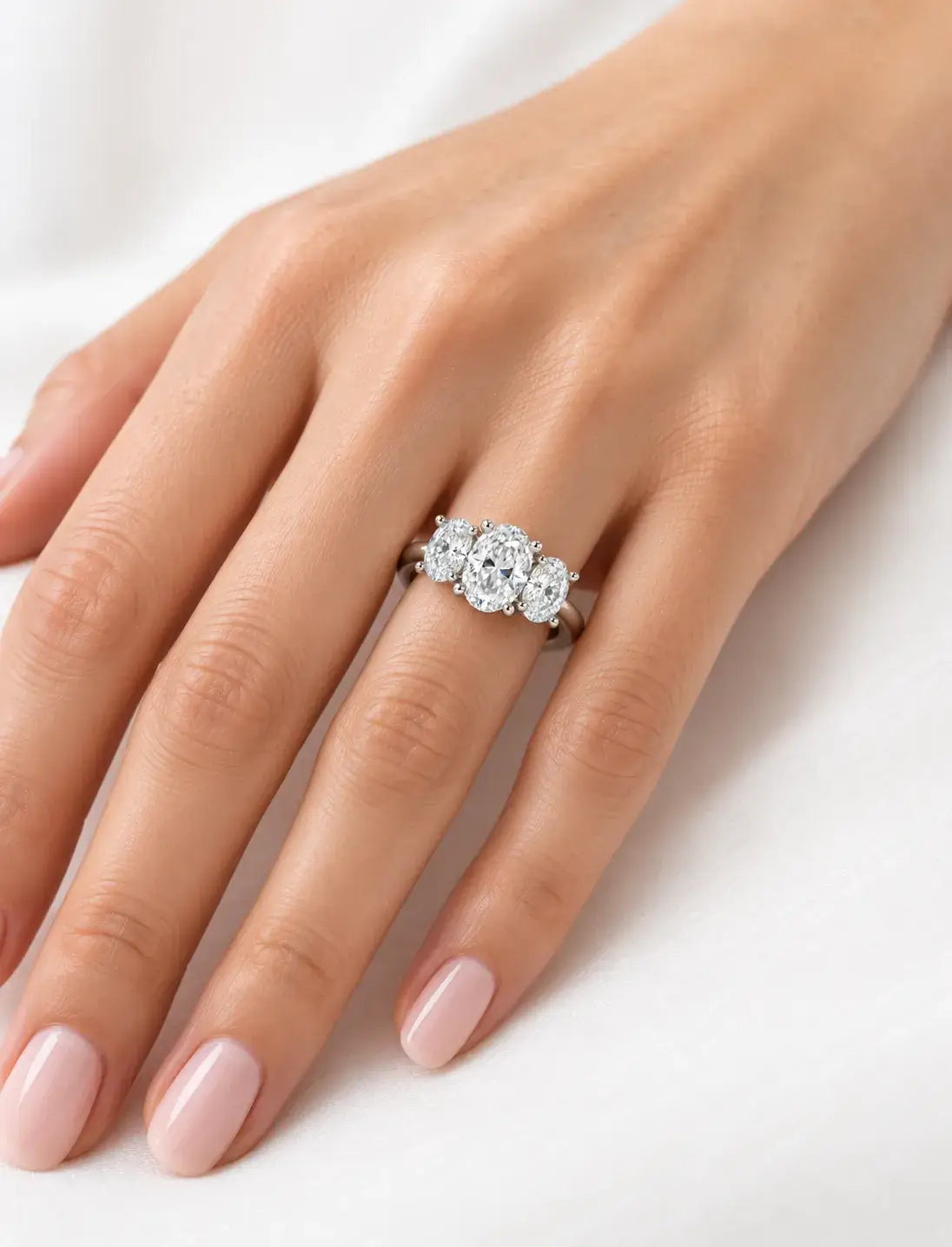 Oval Diamond Engagement Ring 2.16 Carat with side Hidden Halo Trilogy Ring in Platinum