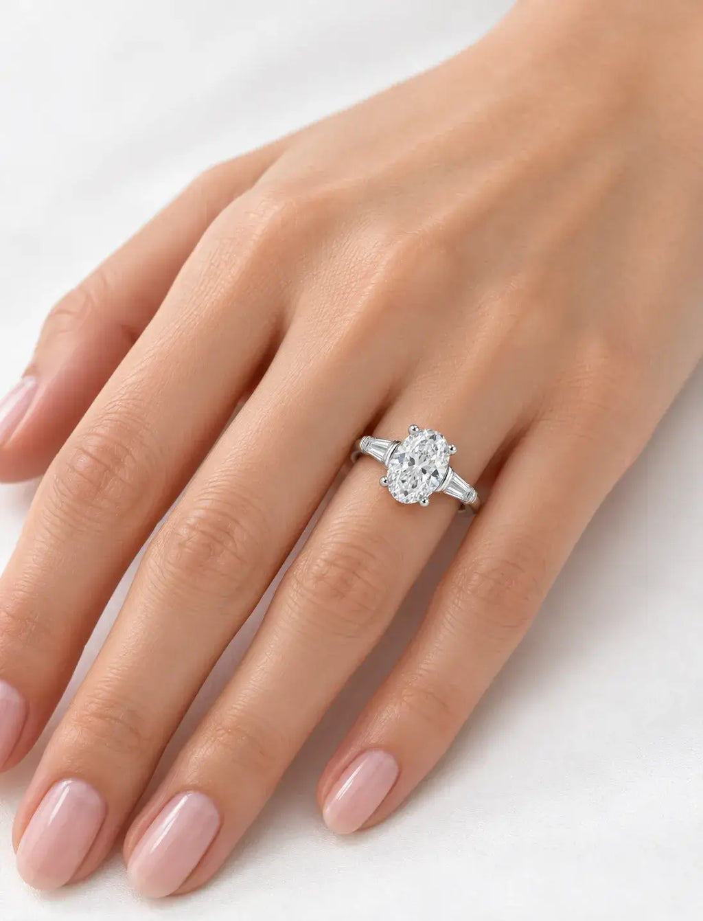 Oval Diamond Engagement Ring 2.10 Carat Baguette Tapper Trilogy IGI Lab Grown Diamond Ring In Platinum