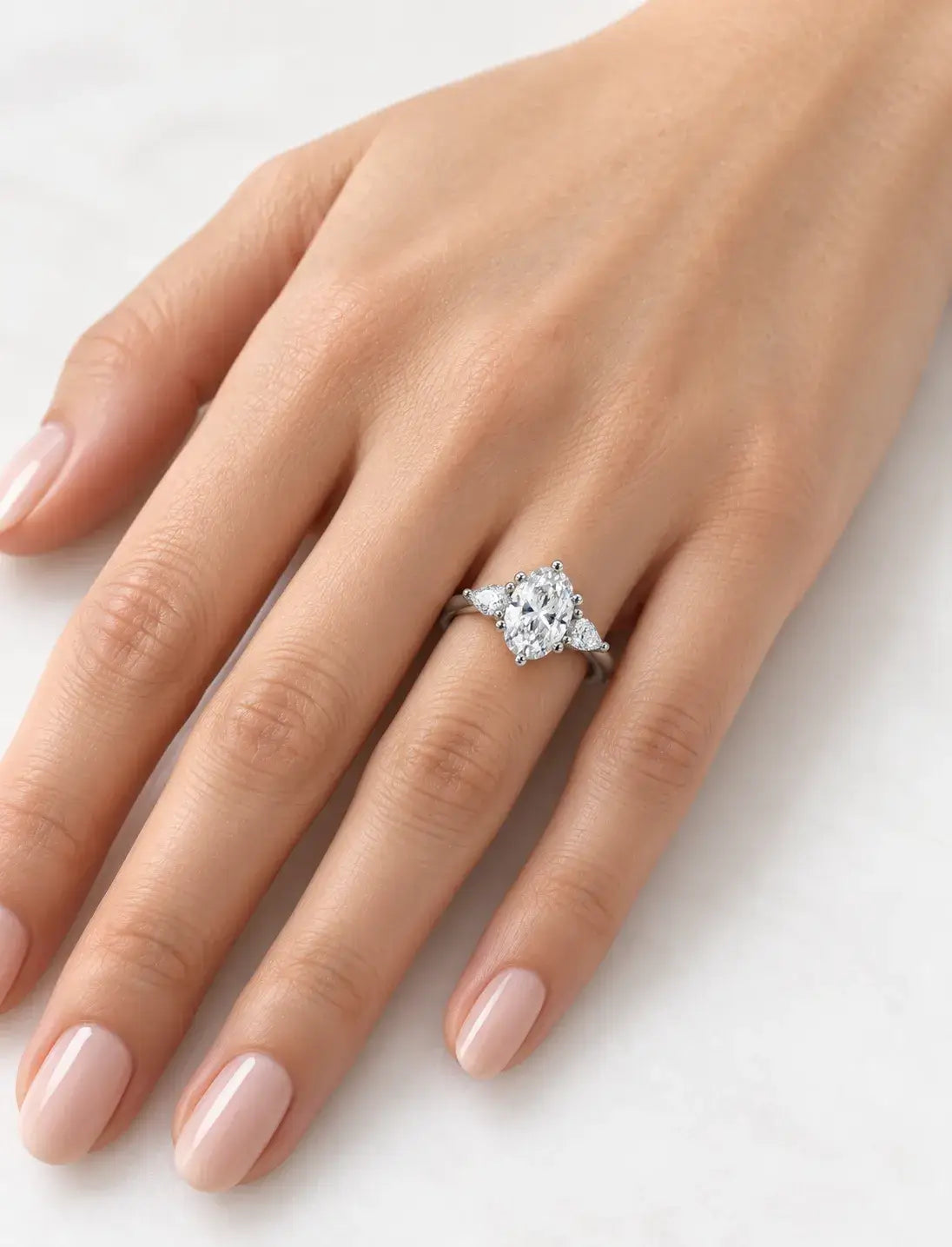 Three Oval Cut Diamond Claw Set Trilogy Side Pear Diamond Anniversary Ring Platinum Lab Grown IGI Certified