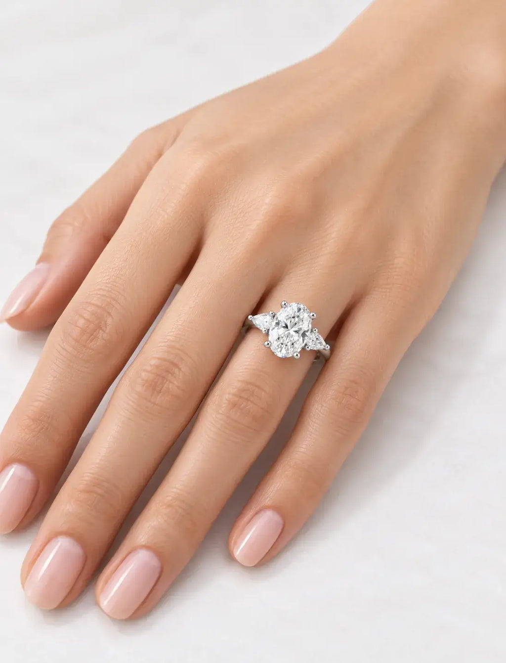 Oval Cut Diamond 1.70 Carat Lab Grown IGI Certified Claw Set Trilogy Side Pear Diamond Anniversary Ring Platinum