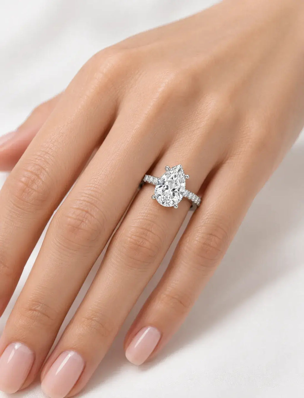 Pear Diamond 5.82 Carat Engagement Ring  With Side Pave Set Lab Grown IGI Certified Round Brilliant Cut Diamond Ring in Platinum