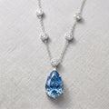 IGI Certified 6.00 Ct Fancy Blue Pear Diamond Necklace in White Gold