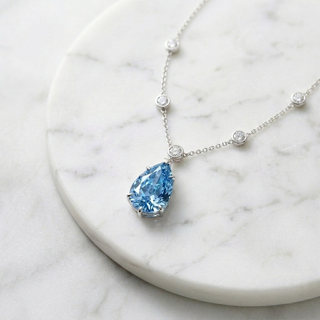 IGI Certified 6.00 Ct Fancy Blue Pear Diamond Necklace in White Gold