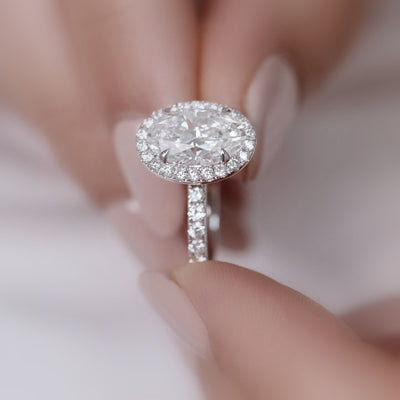 IGI Certified E/VS 2.50Ct Oval Diamond Halo Engagement Ring in Platinum