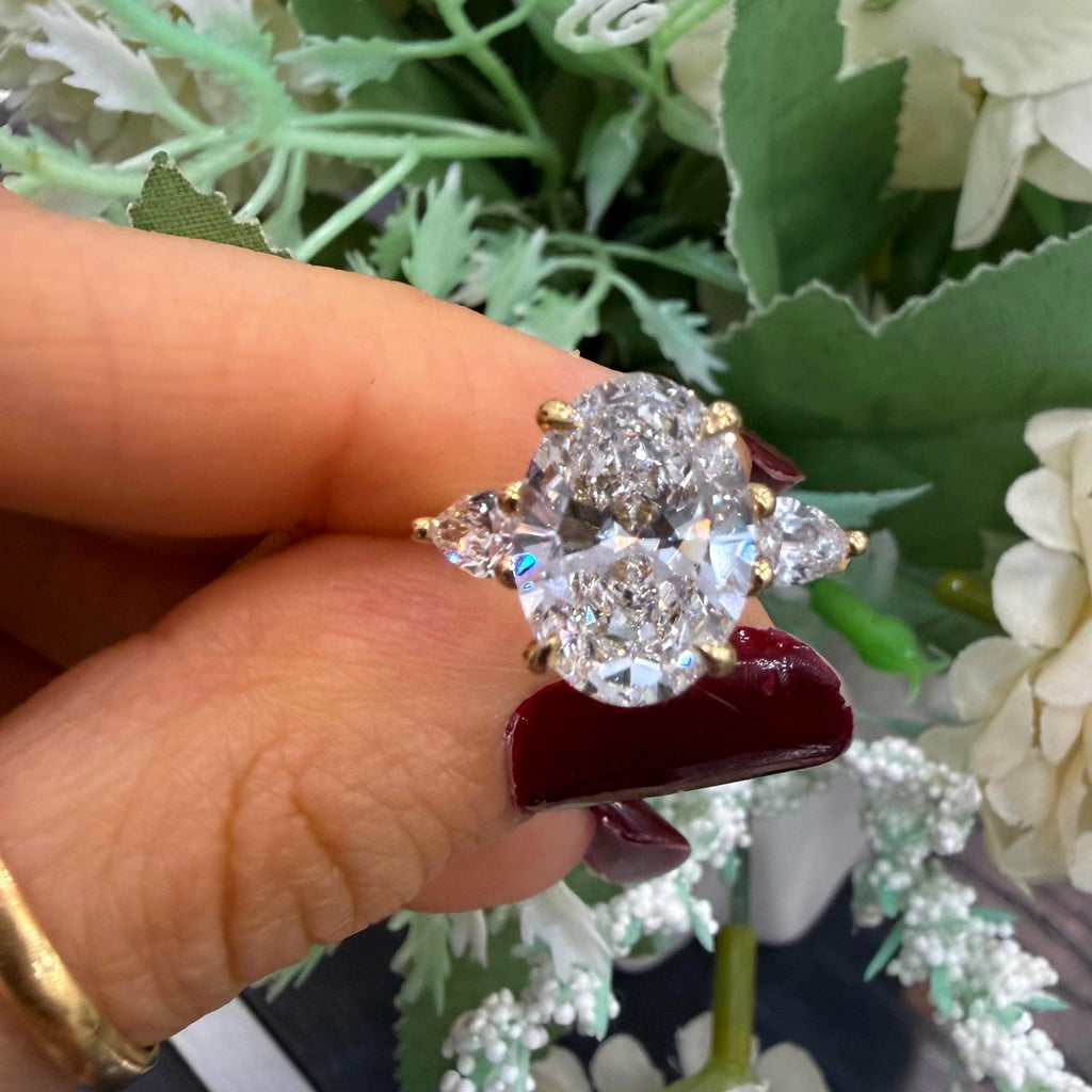 IGI 4.20ct E/VS Oval & Pear Lab Diamond Three-Stone Ring In 18k Yellow Gold