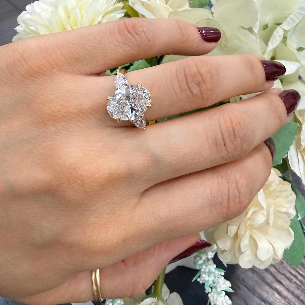 IGI 4.20ct E/VS Oval & Pear Lab Diamond Three-Stone Ring In 18k Yellow Gold