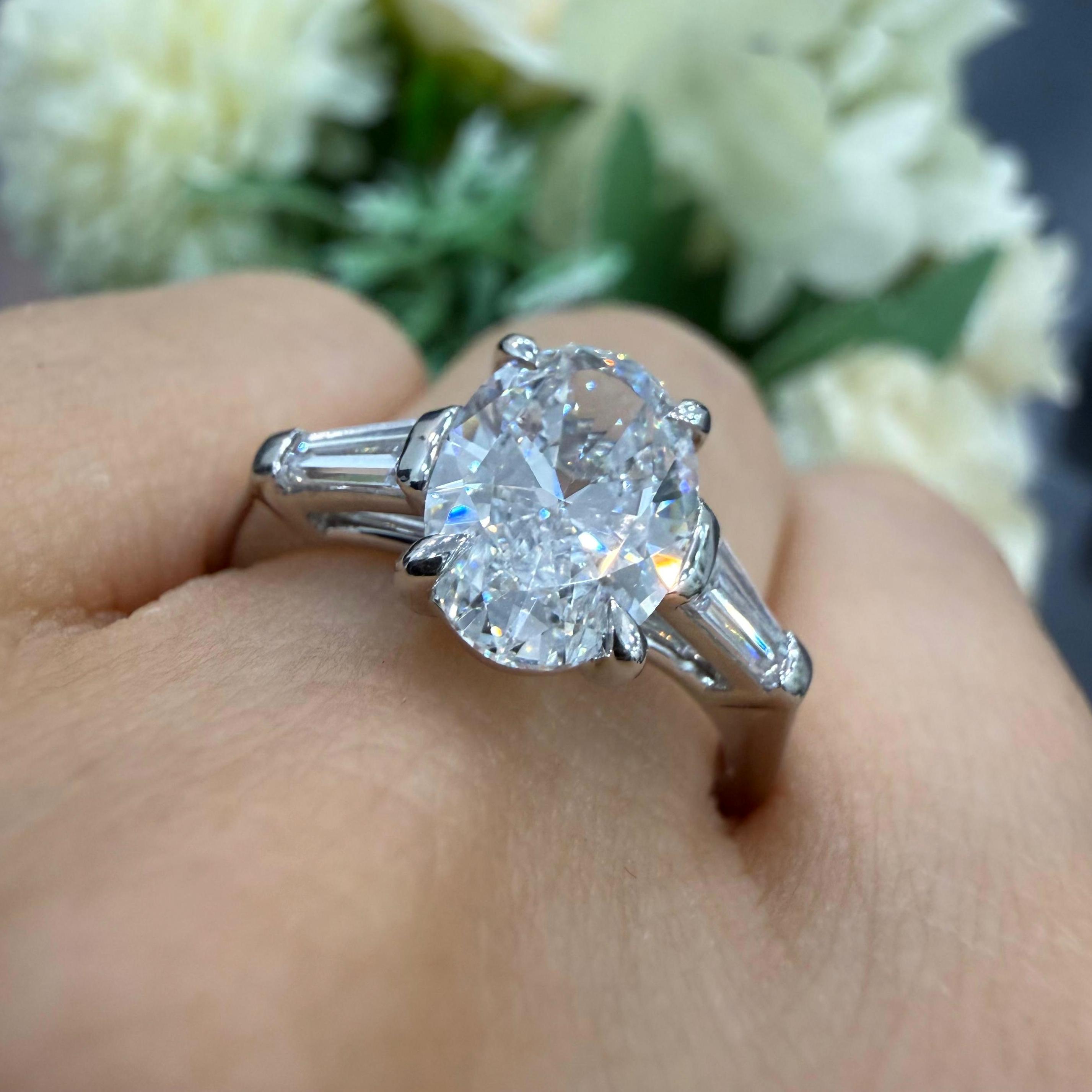 IGI 2.10ct D/VVS Oval & Baguette Lab Diamond Three-Stone Ring In Platinum