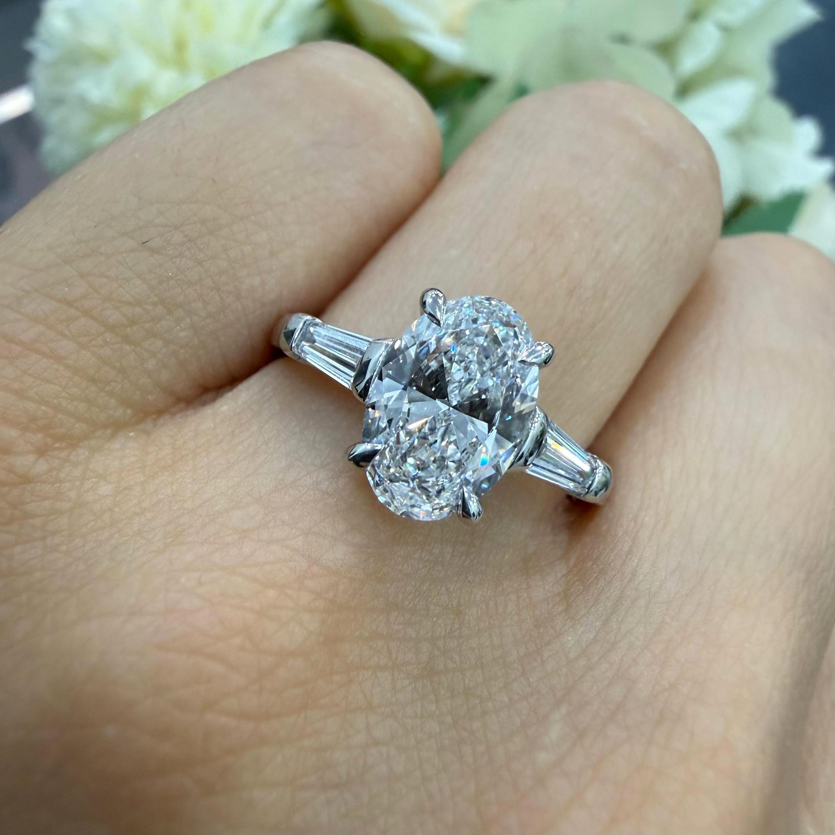 IGI 2.10ct D/VVS Oval & Baguette Lab Diamond Three-Stone Ring In Platinum