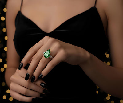 Rare Beauty: 12.00ct Fancy Vivid Green Pear Diamond Trilogy Ring in Platinum