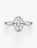 IGI Certified Lab Grown Oval Diamond Bezel Set Solitaire Engagement Ring in Platinum