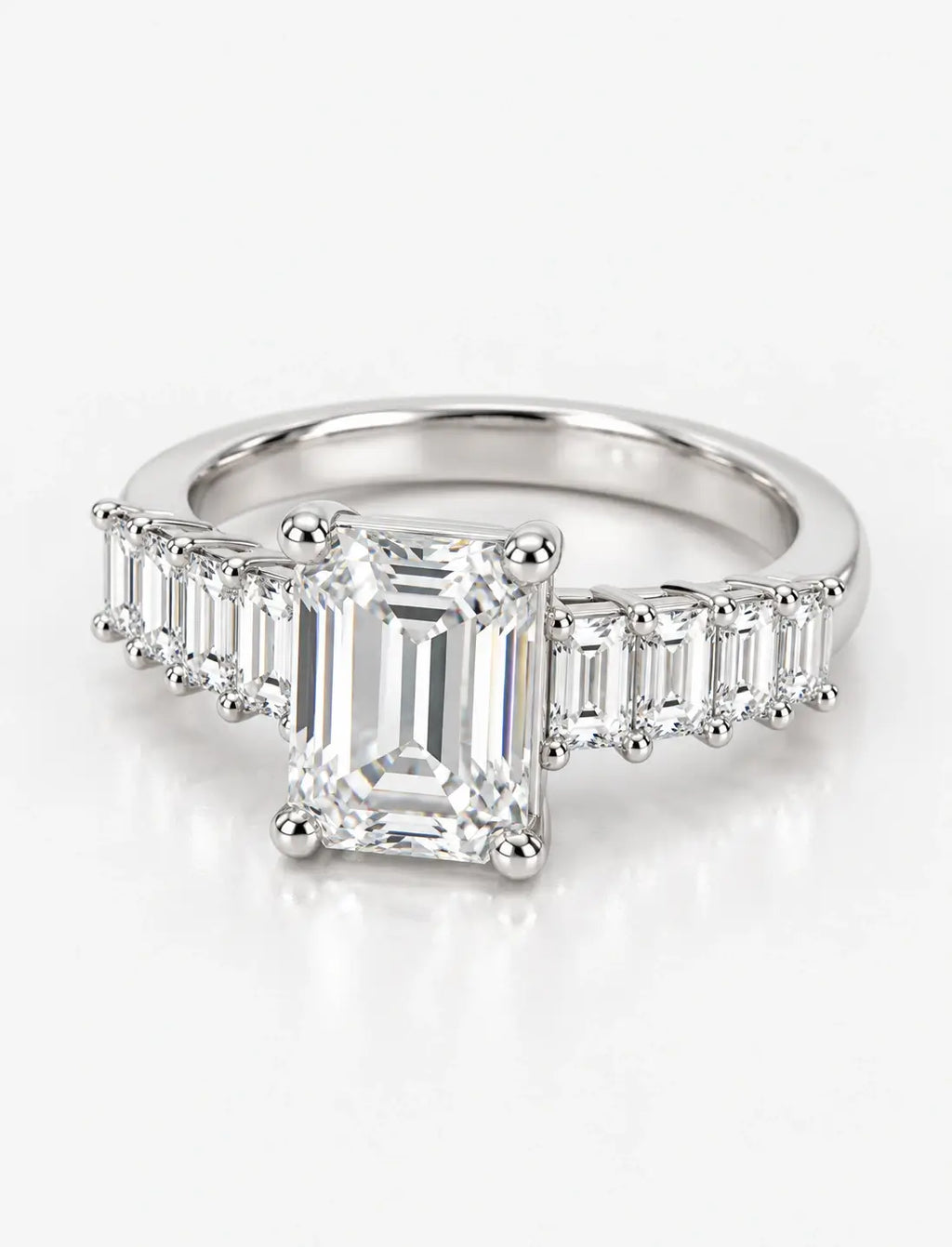 Emerald-Cut Lab Grown Diamond Engagement Ring with Prong-Set IGI Certified Emerald Side Stones in Platinum