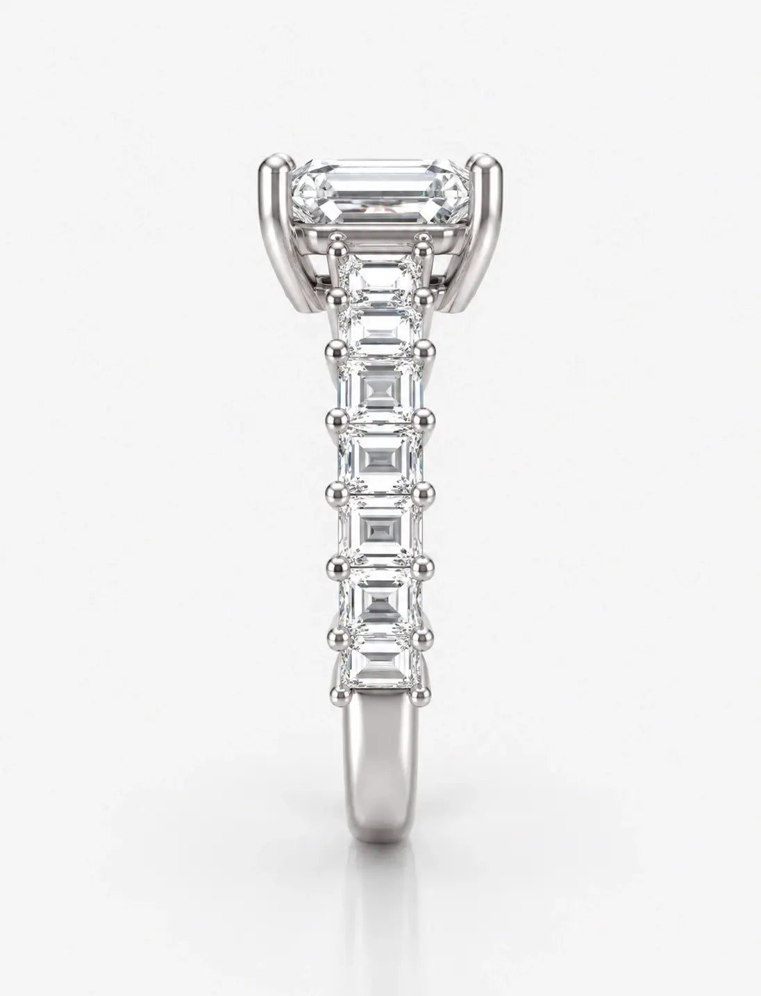 Emerald-Cut Lab Grown Diamond Engagement Ring with Prong-Set IGI Certified Emerald Side Stones in Platinum