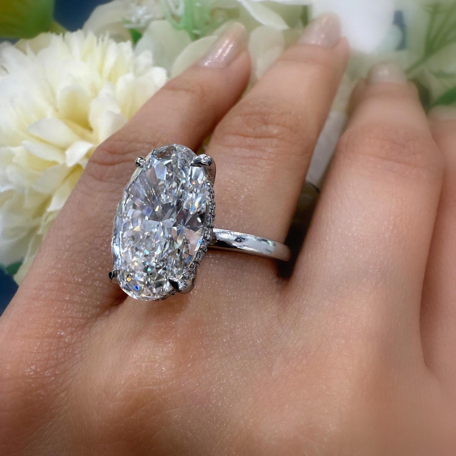 Platinum Engagement Ring with Large Oval Lab Diamond and Hidden Halo
