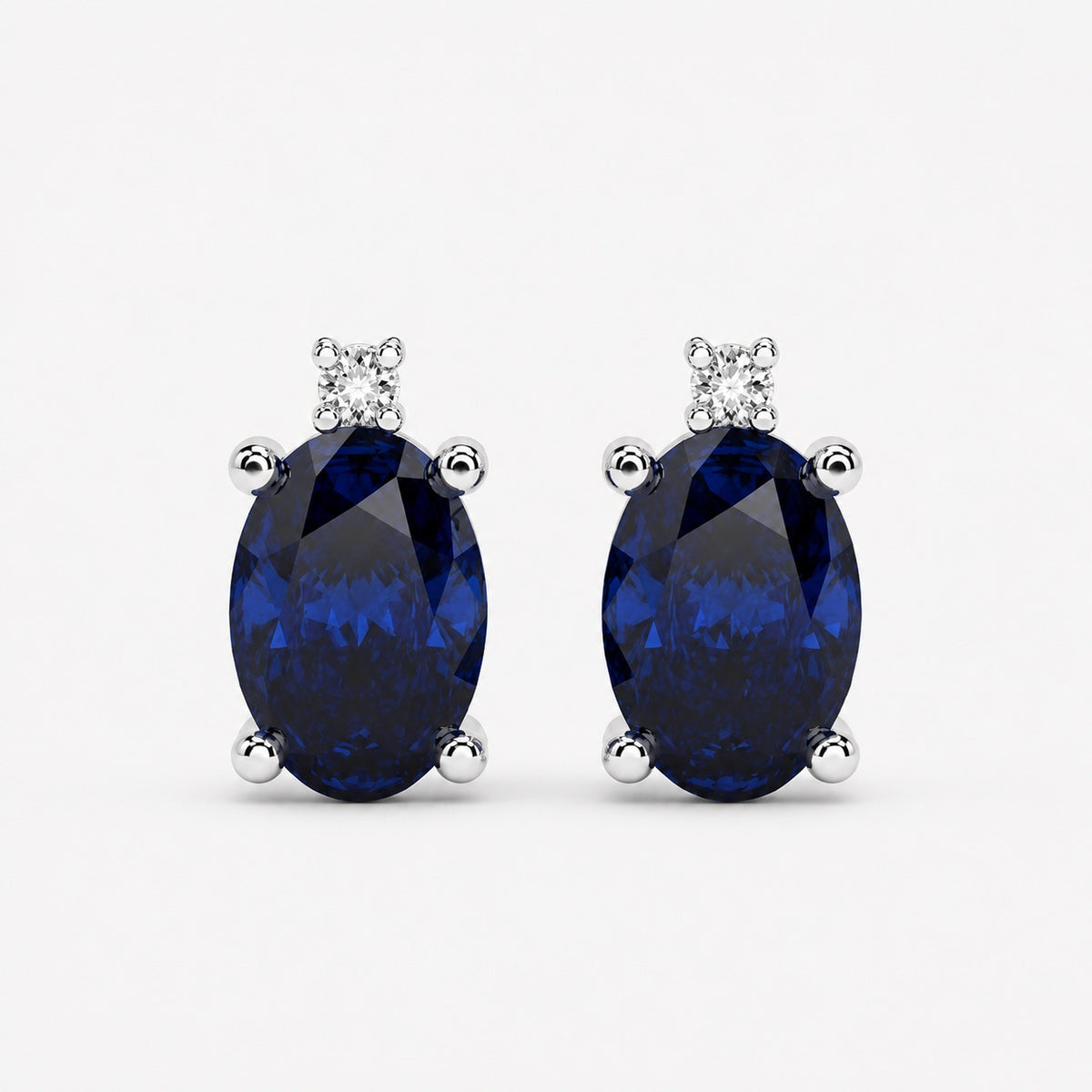 0.60 Ct Sapphire & Diamond Designer Earrings in White Gold