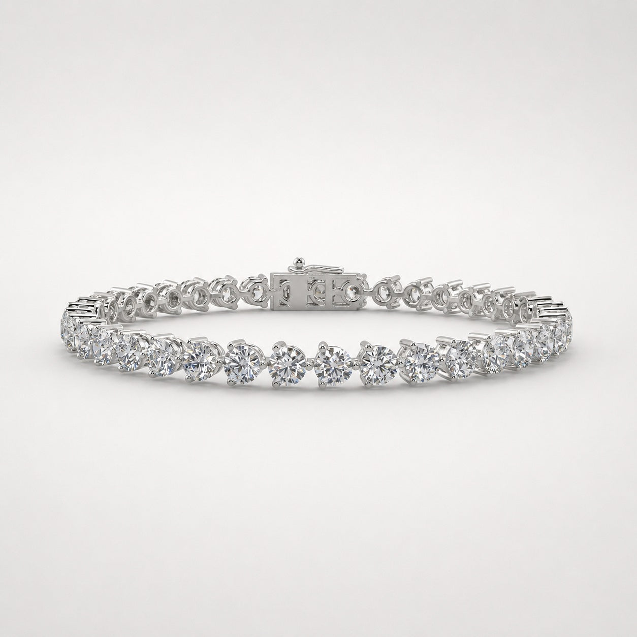 Round lab-grown diamond three-prong tennis bracelet