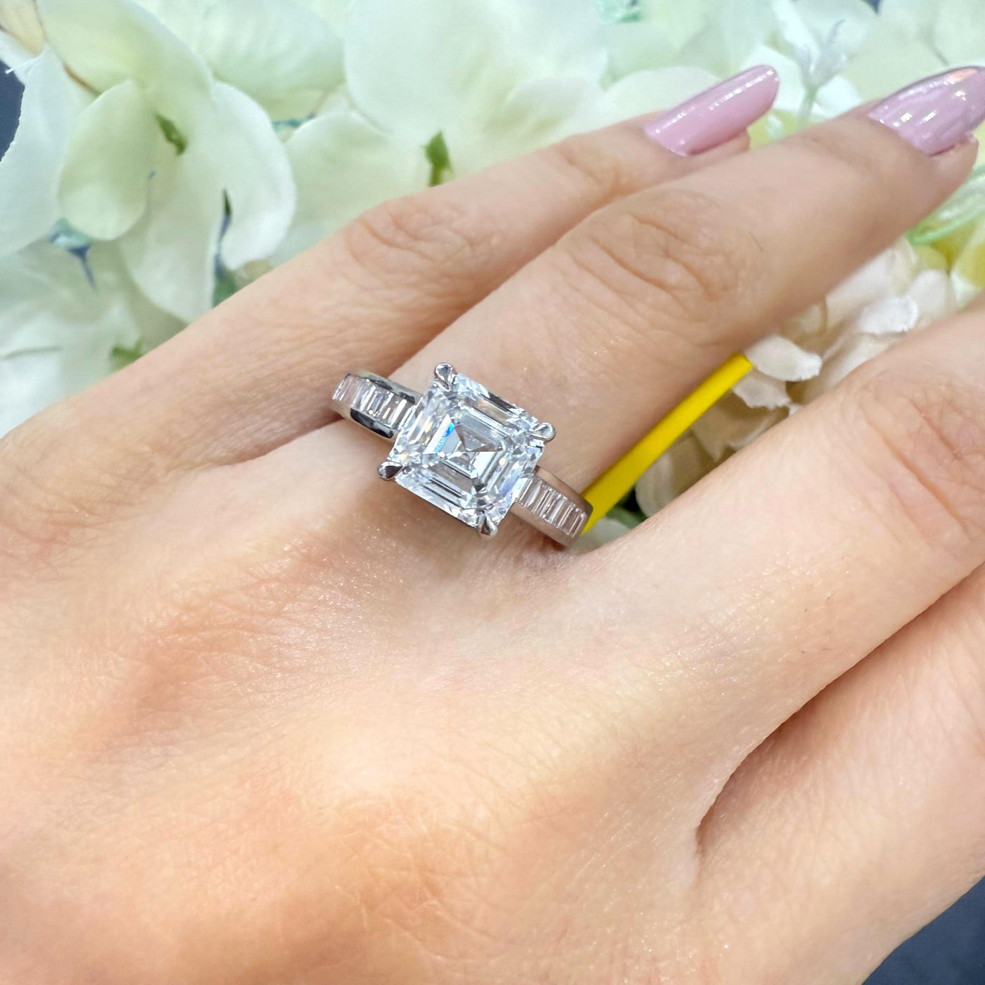 Asscher & Baguette Diamond Engagement Ring in Platinum. E/VS quality, UK hallmarked, ethical luxury, free shipping.