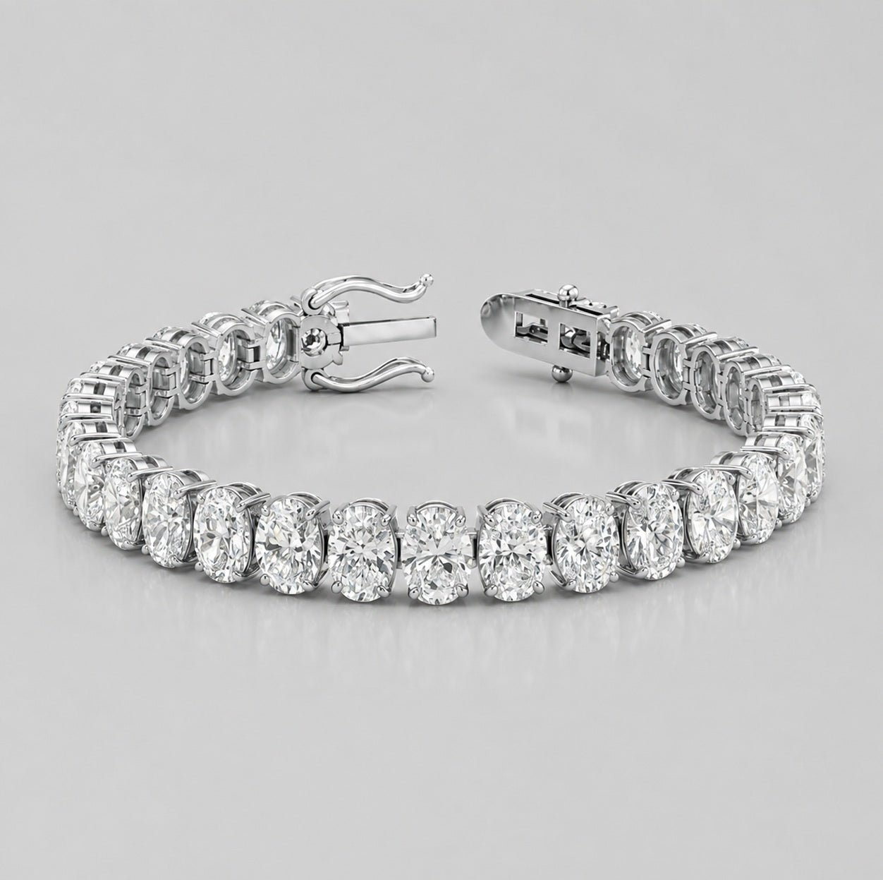 Vertical Oval Diamond Vertical Tennis Bracelet in Gold & Platinum (8Ct-30Ct)